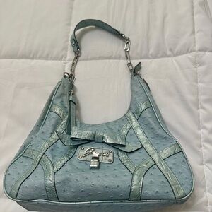Guess shoulder bag. Faux ostrich, blue with bow